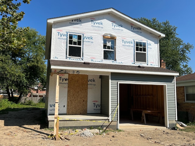 property under construction featuring a garage