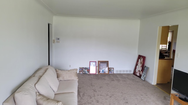 living area with carpet flooring