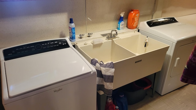 laundry area with washer and clothes dryer