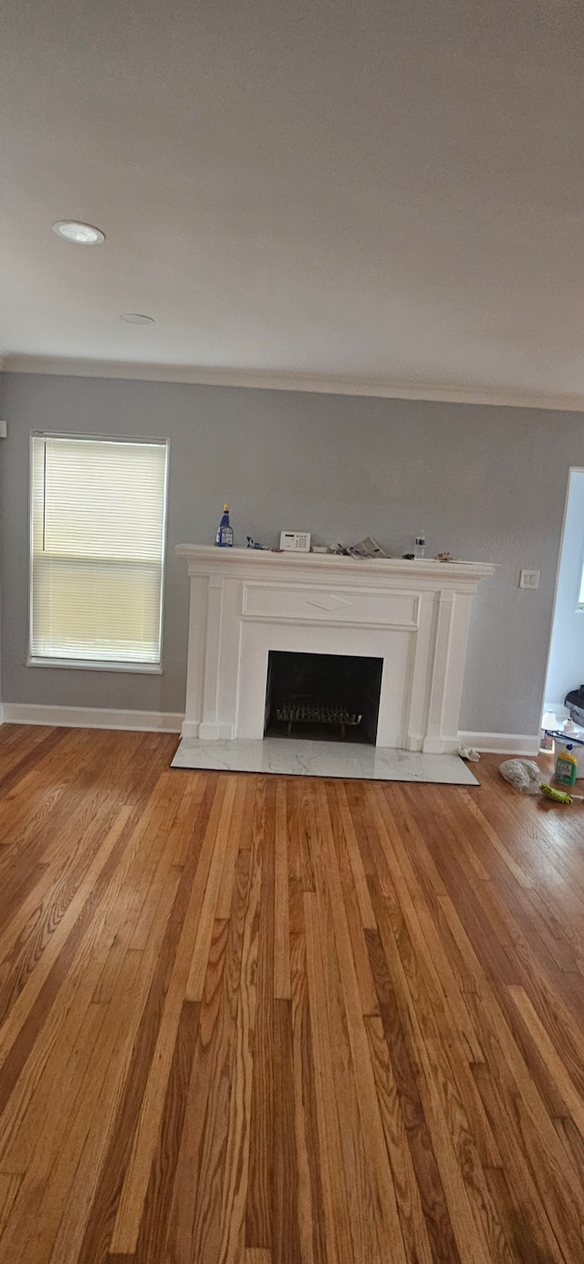 unfurnished living room featuring hardwood / wood-style floors