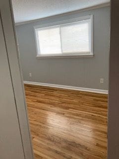 unfurnished room featuring light hardwood / wood-style floors