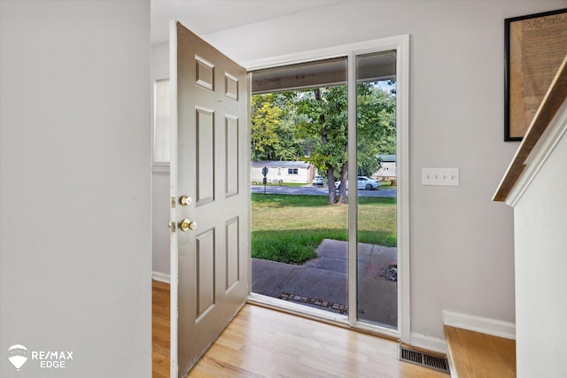 entrance foyer featuring light wood-type flooring