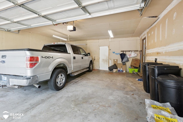 garage featuring a garage door opener