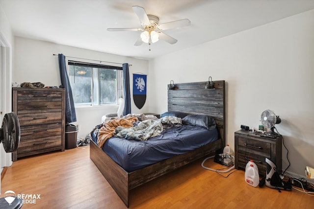 bedroom featuring ceiling fan and light wood-type flooring