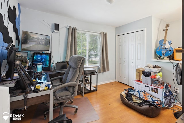 home office featuring light hardwood / wood-style floors