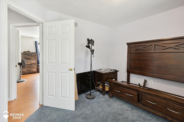 bedroom with light wood-type flooring