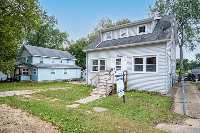 view of front of house with a front yard