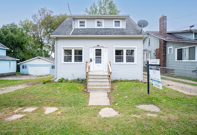 bungalow-style home with a front yard