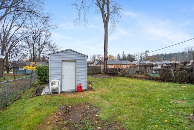 view of yard with a storage unit