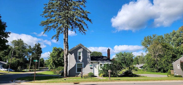 view of property with a front lawn