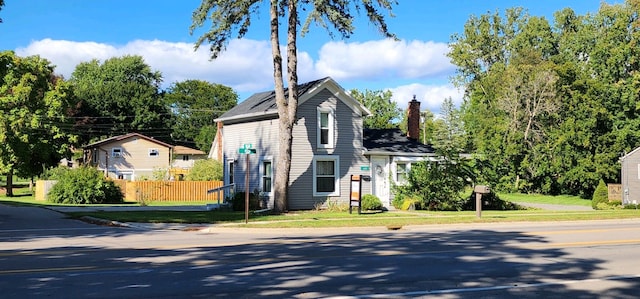 view of front of home with a front lawn