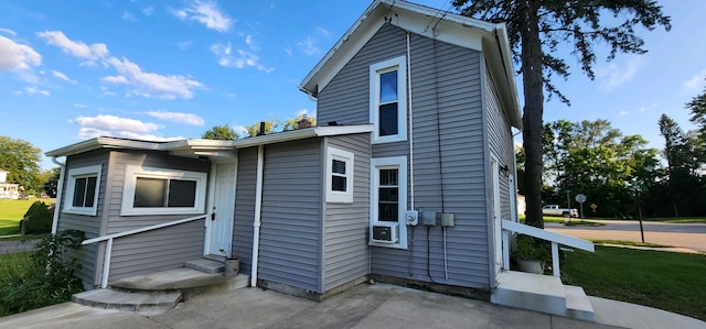 back of property featuring a patio area