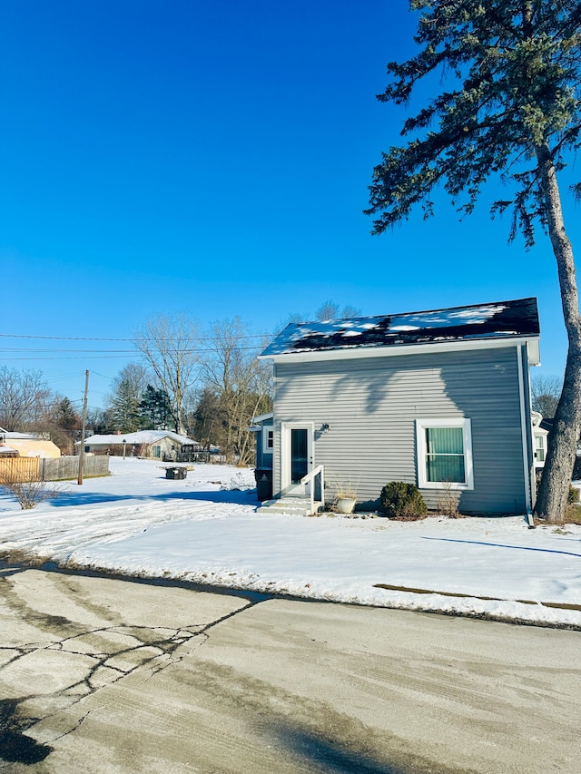 view of snow covered property