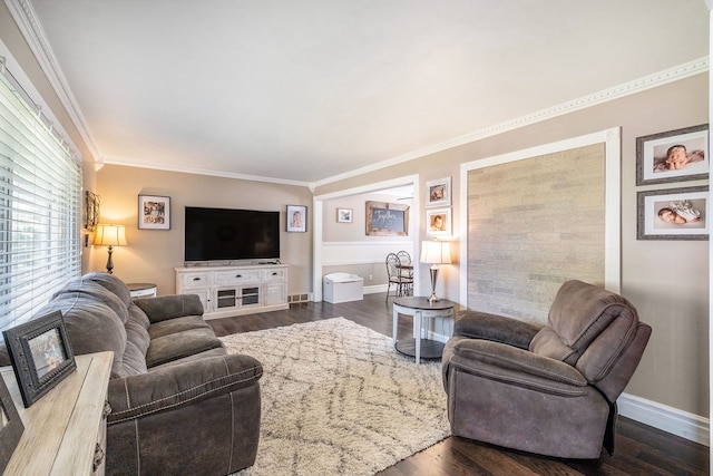 living room with crown molding and dark wood-type flooring