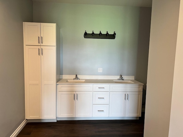 bathroom featuring hardwood / wood-style floors and vanity