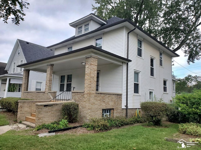 exterior space featuring a front lawn