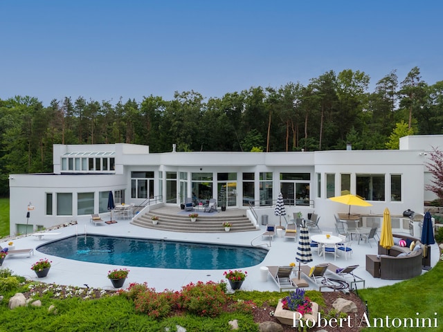 rear view of house with a patio area