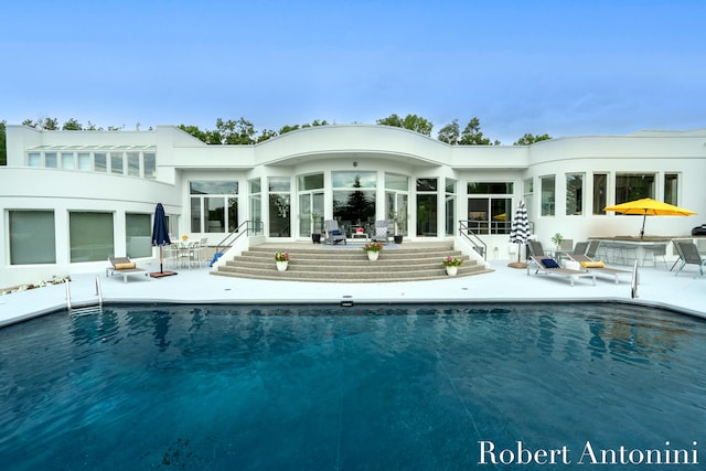 rear view of house with a patio