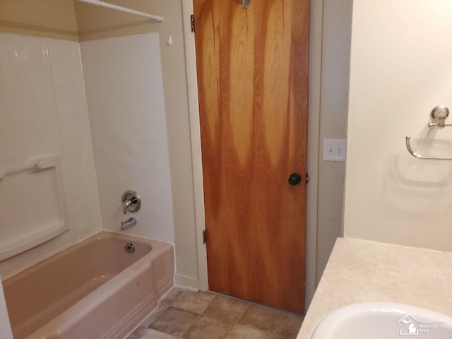 bathroom featuring sink and bathtub / shower combination