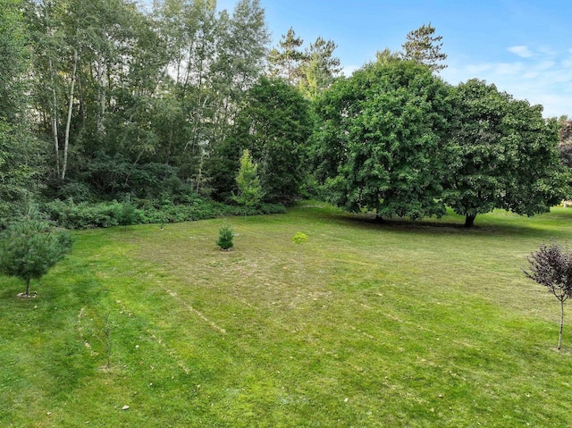9090 Windsong Ln, Cadillac, MI 49601