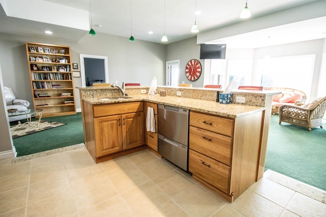 kitchen featuring light carpet, decorative light fixtures, and light stone countertops