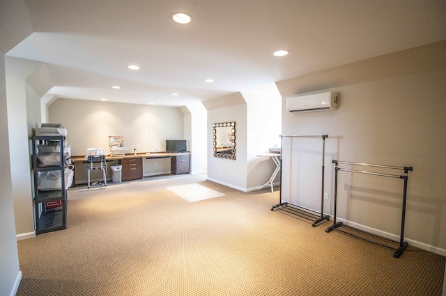 interior space featuring a wall mounted air conditioner and carpet floors