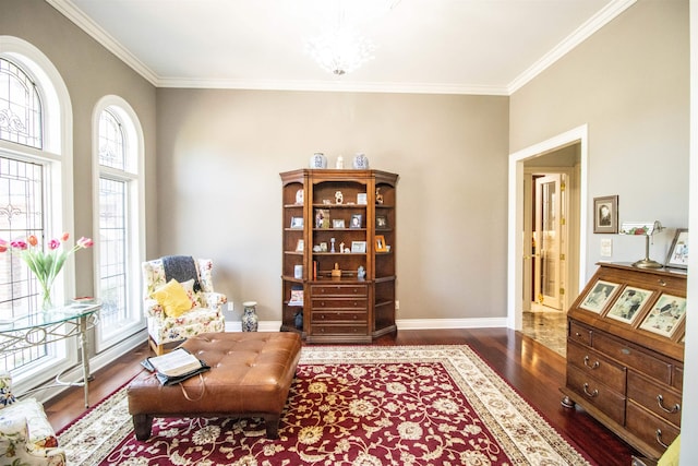 living area featuring dark hardwood / wood-style flooring, a notable chandelier, and ornamental molding