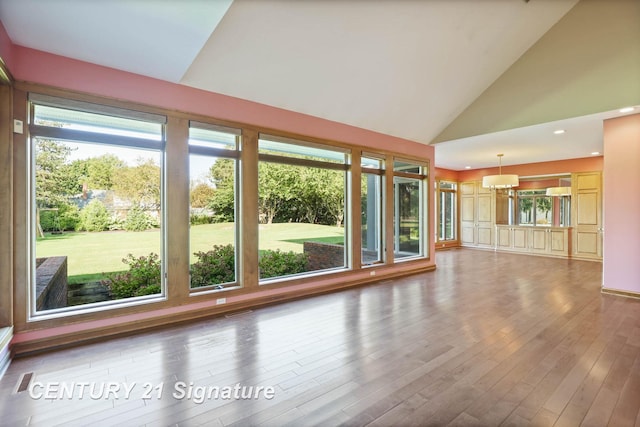 interior space featuring vaulted ceiling