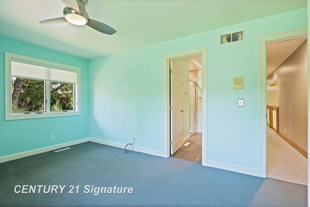 unfurnished bedroom with carpet, ceiling fan, and ensuite bath