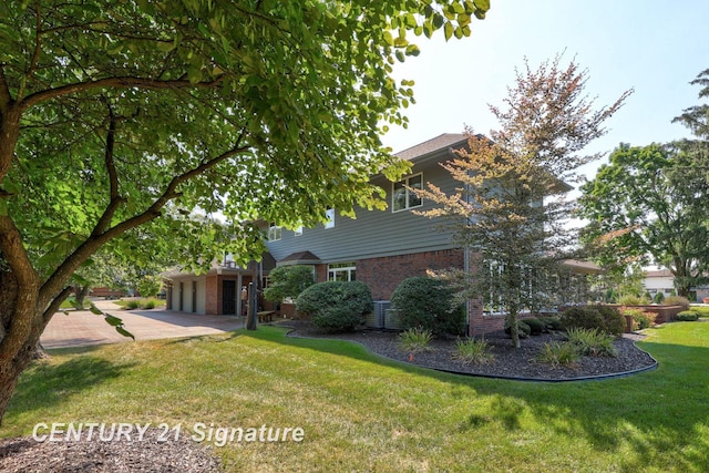 view of property exterior featuring a lawn