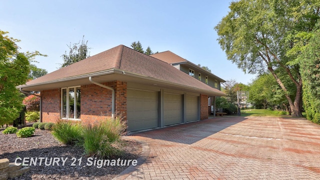 view of home's exterior with a garage