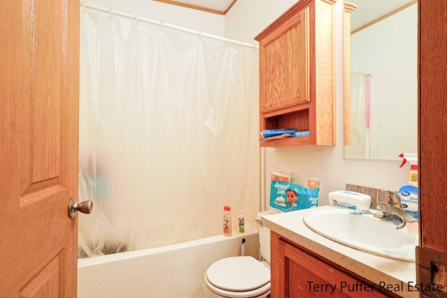 full bathroom featuring crown molding, vanity, shower / bath combo, and toilet