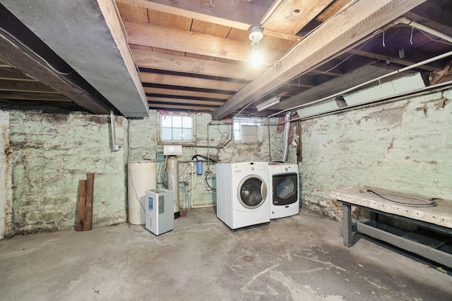 basement featuring washer and clothes dryer