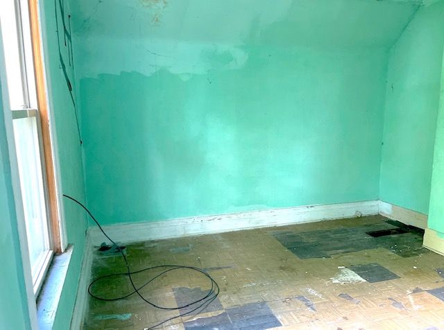 3872 Fischer St, Detroit, MI 48214 - spare room with baseboards