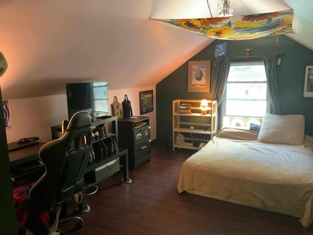 bedroom featuring dark hardwood / wood-style floors and vaulted ceiling