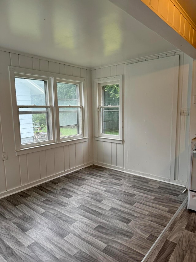 spare room with hardwood / wood-style flooring