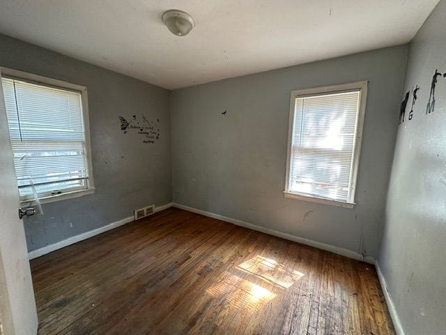 18538 Trinity St, Detroit, MI 48219 - spare room with wood finished floors and baseboards