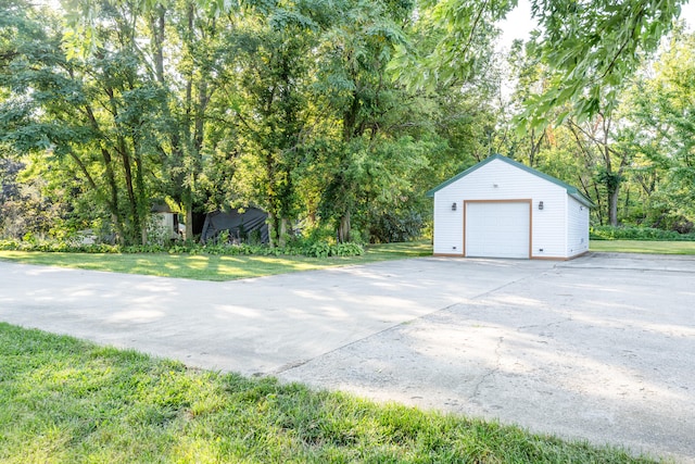 garage featuring a yard