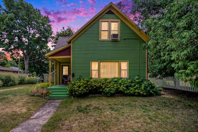 view of front of home with a yard