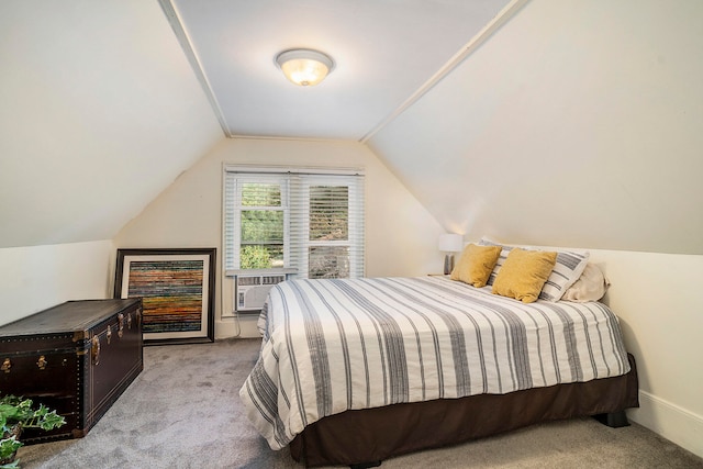 carpeted bedroom featuring vaulted ceiling