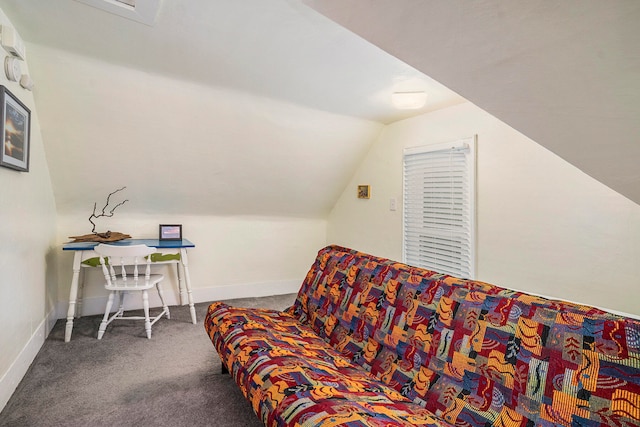 sitting room with carpet flooring and lofted ceiling