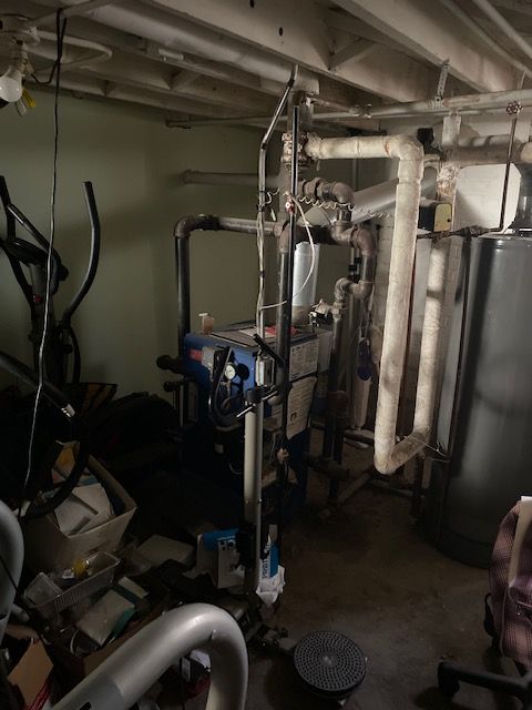 5051 Bishop St, Detroit, MI 48224 - workout area with water heater