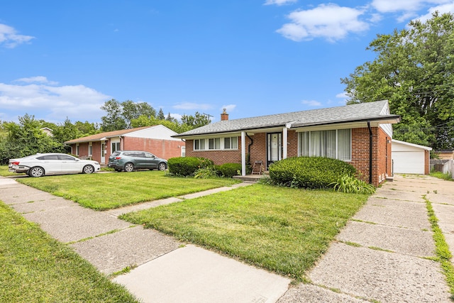 ranch-style home with a front yard and a garage