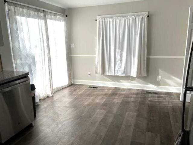 interior space with dark wood-type flooring