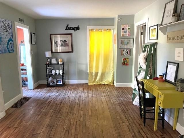 misc room with dark hardwood / wood-style floors