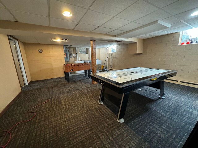 2065 S Lapeer Rd, Lapeer, MI 48446 - recreation room with carpet flooring, concrete block wall, baseboard heating, and a paneled ceiling