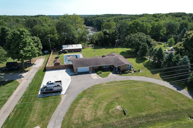 2065 S Lapeer Rd, Lapeer, MI 48446 - view of property location featuring a heavily wooded area