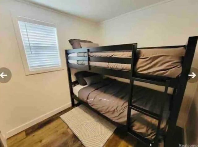 bedroom featuring hardwood / wood-style flooring