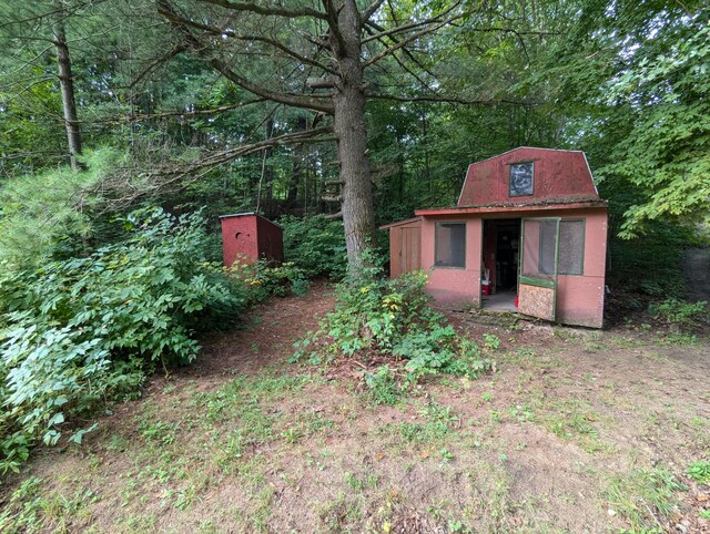 3290 Riverview Dr, Hersey, MI 49639 - view of yard with a wooded view