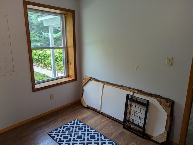 3290 Riverview Dr, Hersey, MI 49639 - spare room featuring wood finished floors and baseboards